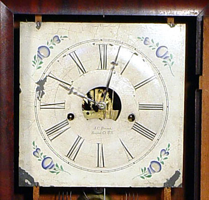 Rosewood ogee clock with eight-day weight driven time only movement